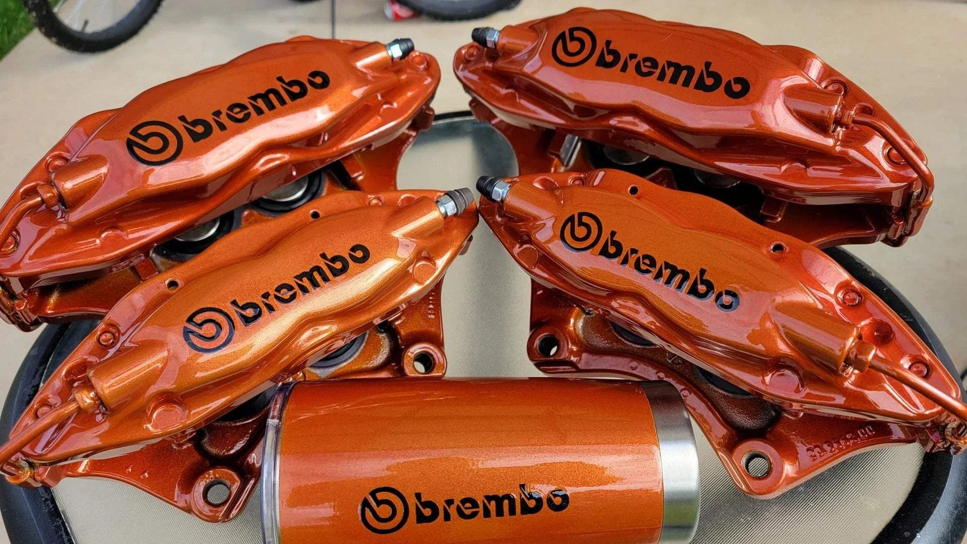 Close-up of a custom powder-coated brake caliper showcasing durable, heat-resistant finish and vibrant color options